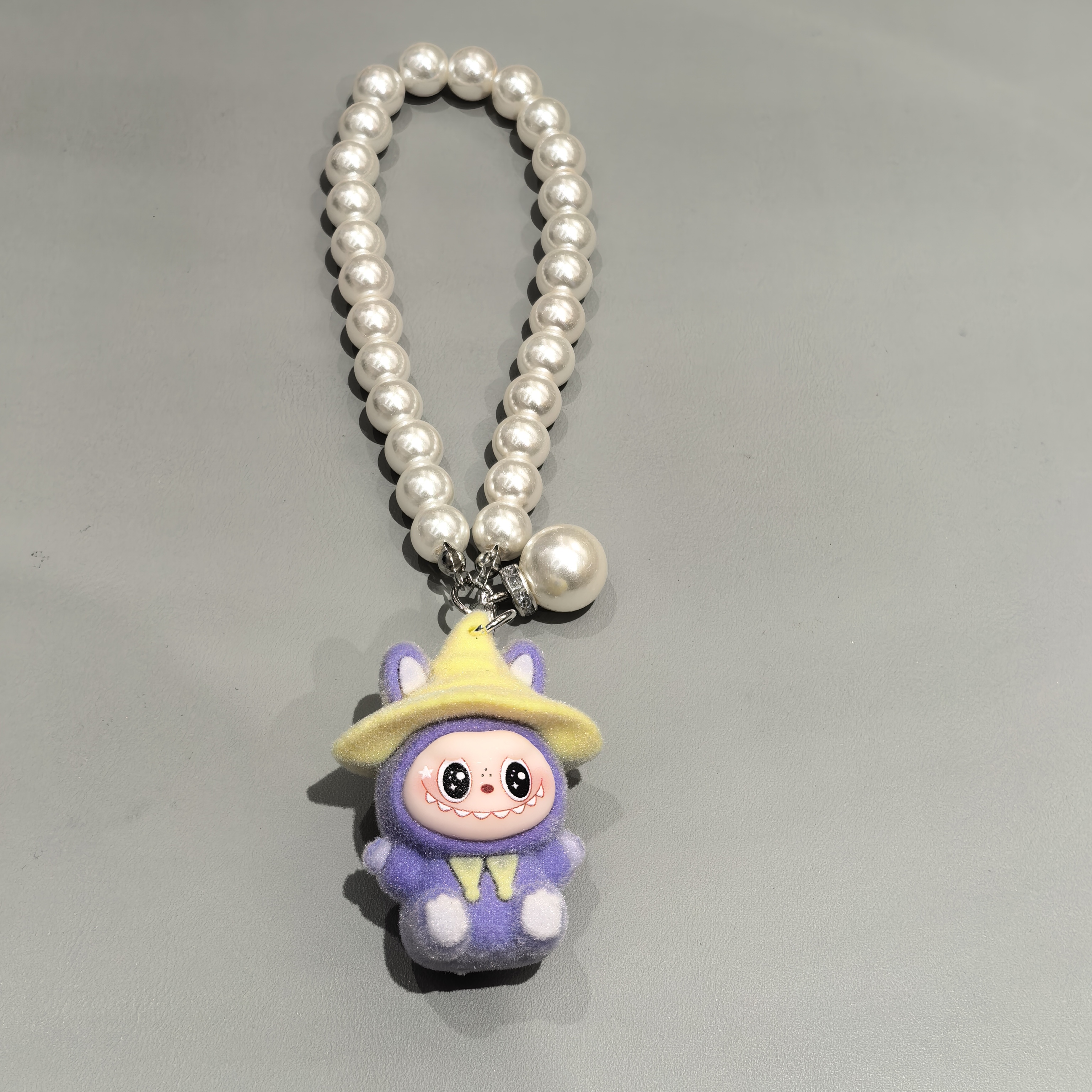 C433黄色小帽子紫色卡通人物包挂件