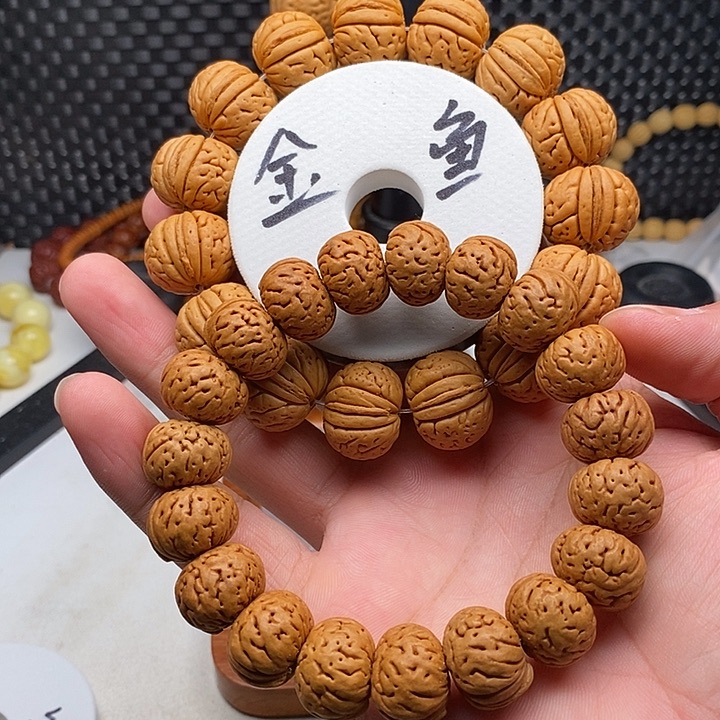 风***散手串文玩核桃金鱼桃核手串