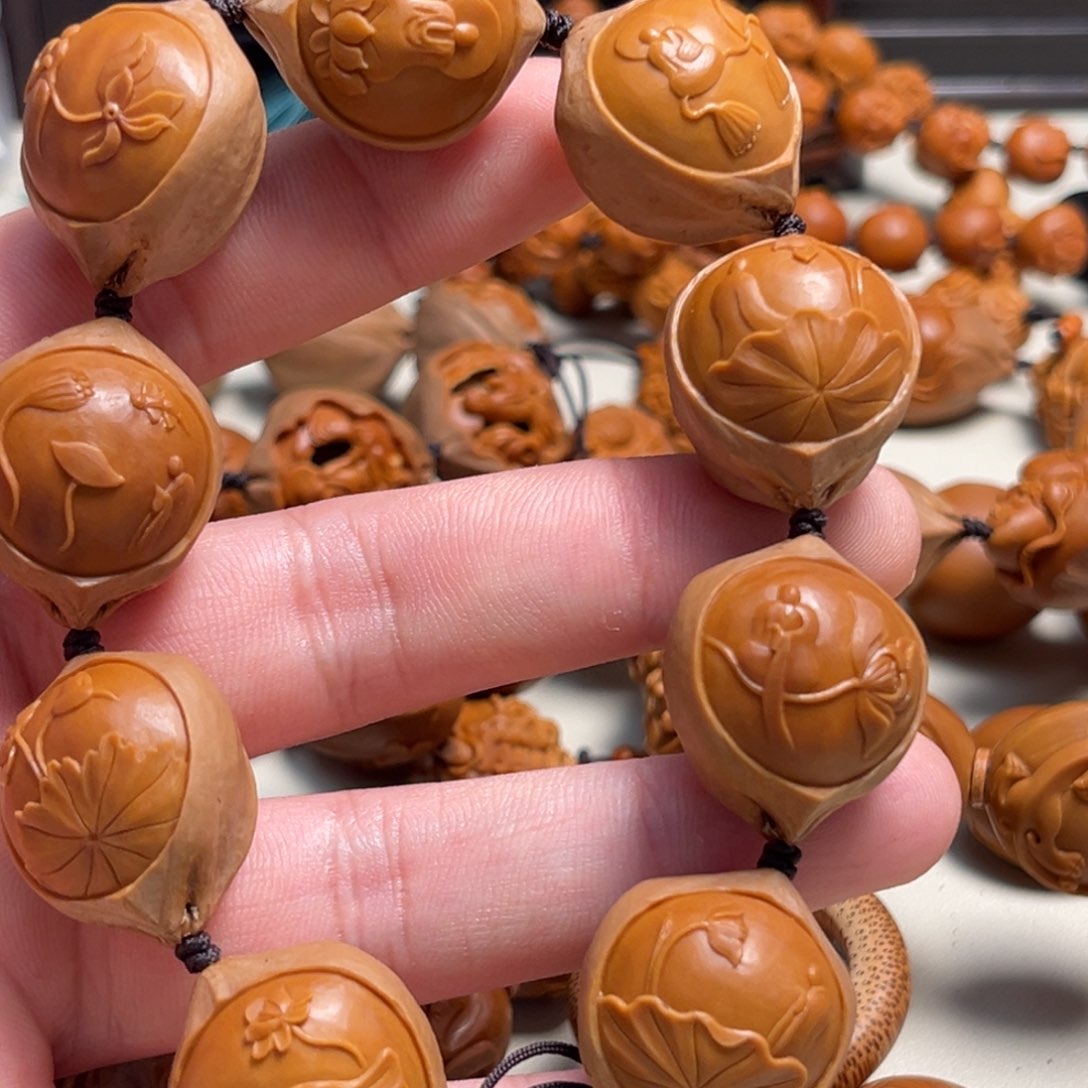 橄榄核吊坠昵***置无相佛