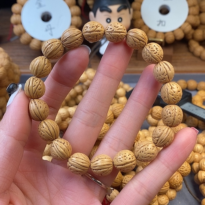 桃核手串凤羽12 （尺寸误差0.5中间）