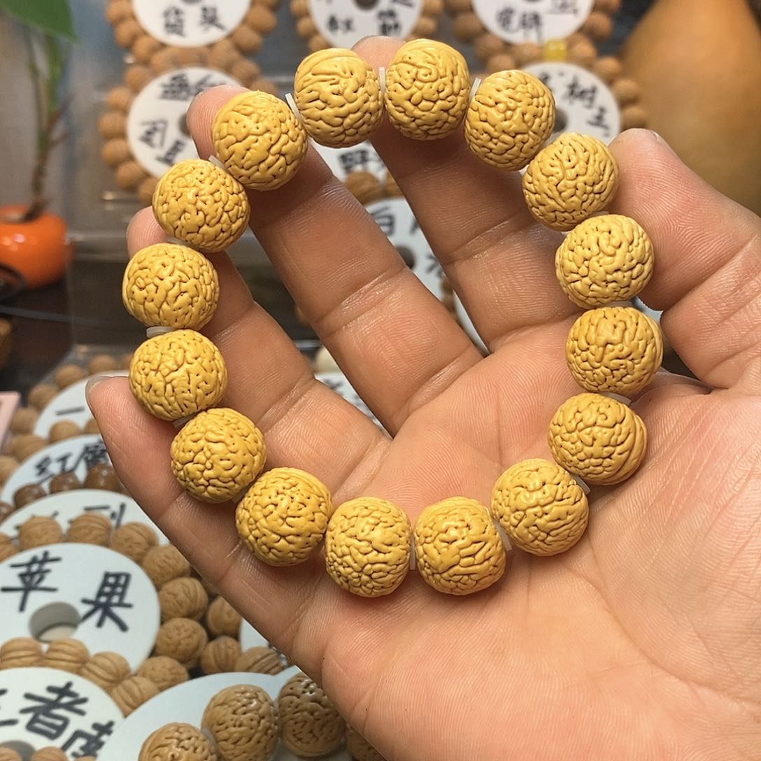 【闪购商品】?***子桃核手串虎皮肌肉
