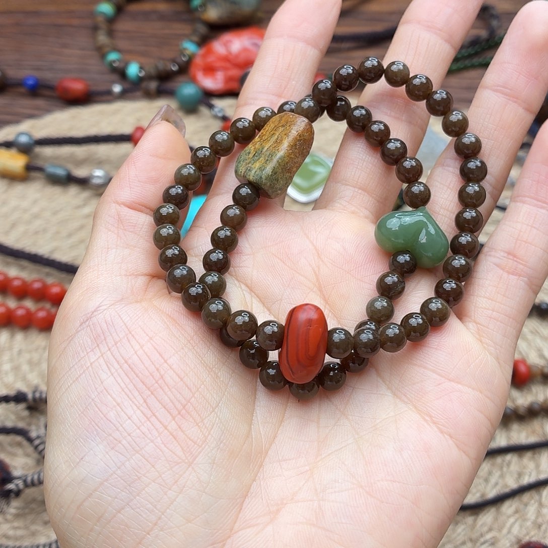 古***带和田玉（糖玉）未镶嵌手链