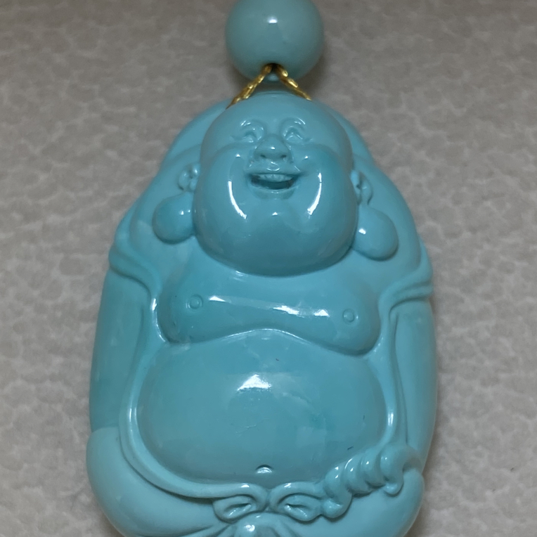 天然高瓷蓝原矿绿松石笑佛尺寸：宽21.2高38厚12