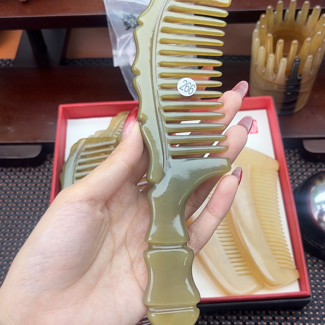 豫***粤手工制作纯牛角梳子