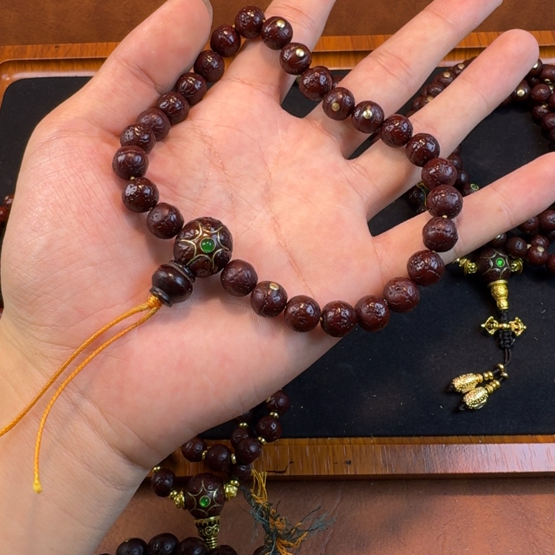 凤眼菩提吊坠手持镶嵌