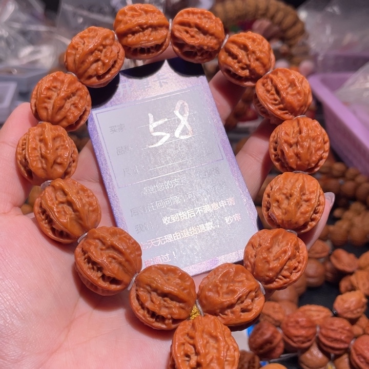 文玩核桃手串58橘红皮龙脊京八棱2.2