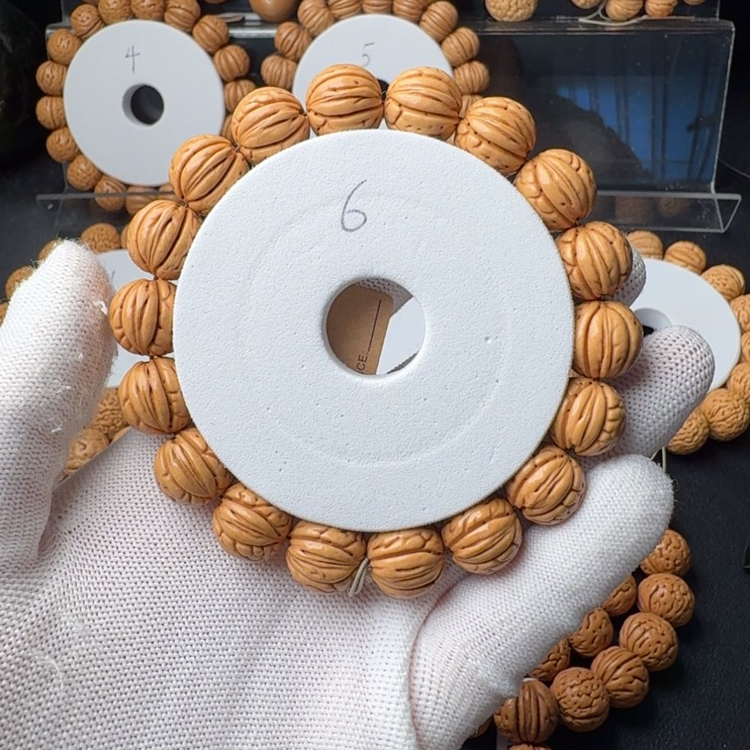 脾***饱桃核手串盘锦野生绣球