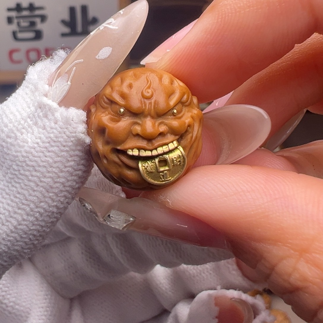 文玩核桃把件镶嵌款见钱眼开17左右尺寸全品有正常封口线