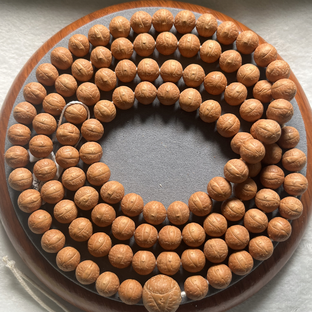 尼泊尔凤眼高山铁油籽脖挂(红皮11.5mm110颗)