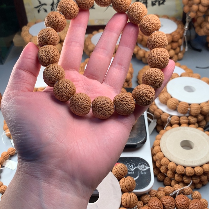 大***友桃核手串龙鳞凤尾