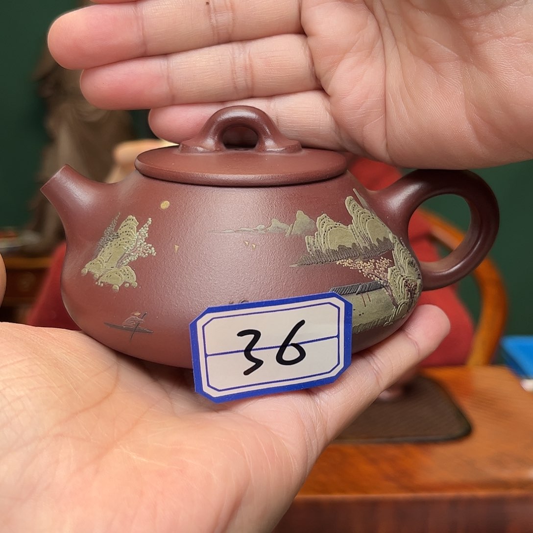 紫砂茶壶泥绘石瓢