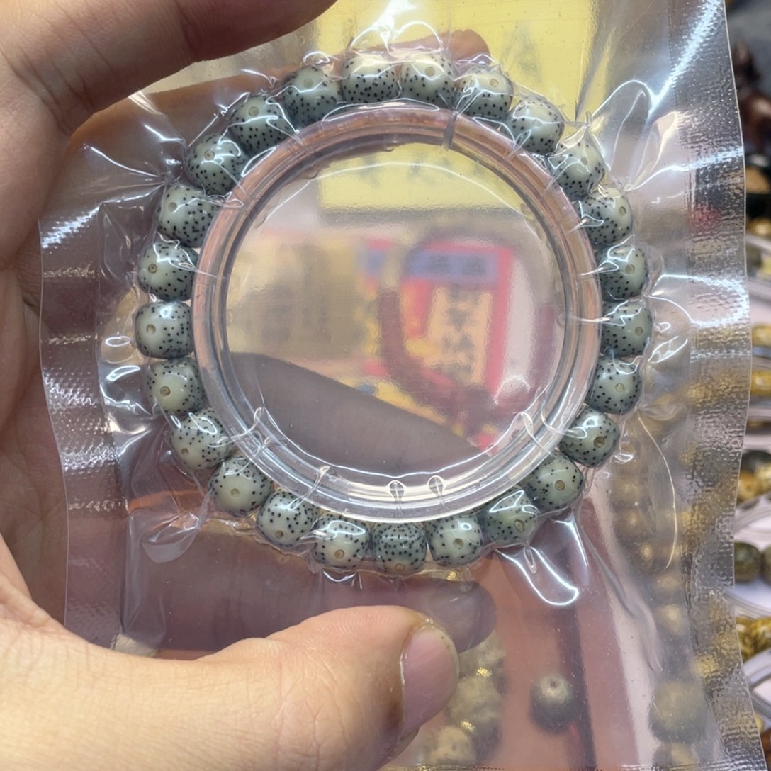 星月菩提手串（928号）绿包白大眼睛小星点约9