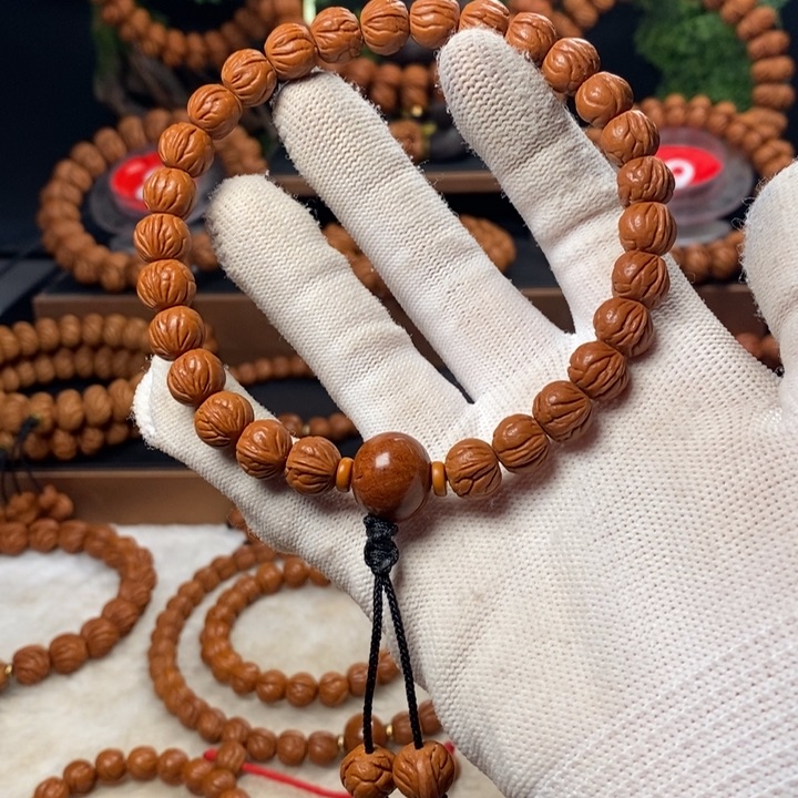 桃核吊坠飞***膀秦岭龙纹