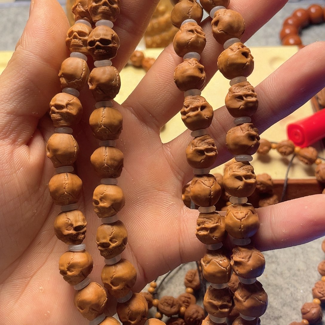 鱼*龙纹桃核雕刻骷髅头脖挂