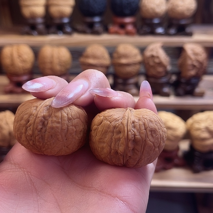 周***琪桃核把件金锭元宝0009