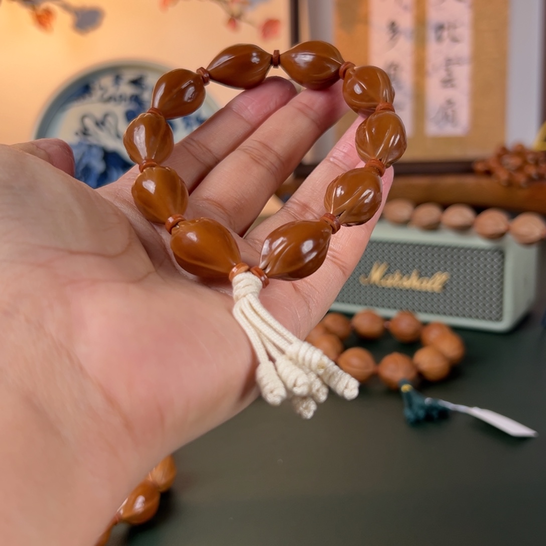 扣***哥手串橄榄核15×25三面佛