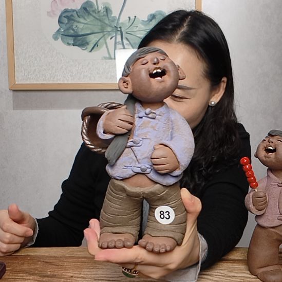 不规则粗砂羲媧娃系列作品挎筐女娃