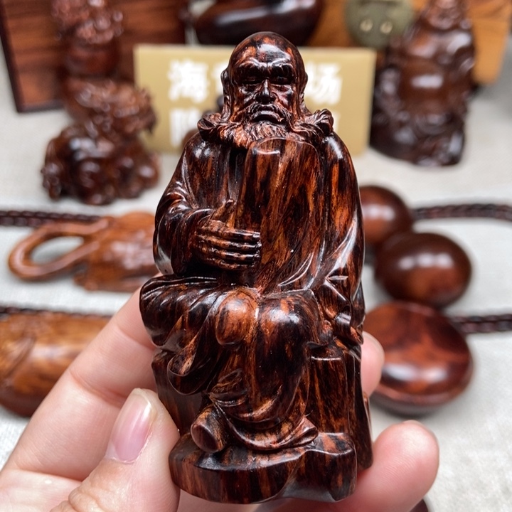 花梨木类案台达摩看书