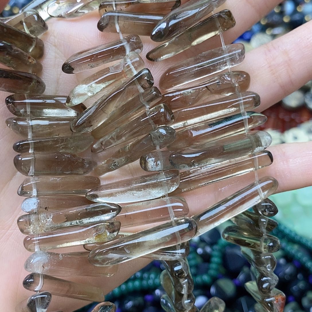 玛瑙/玉髓未镶嵌珠宝半成品茶晶牙牙一条