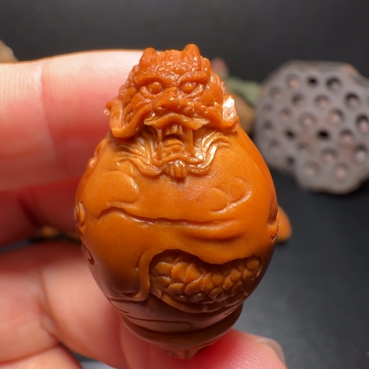 橄榄核吊坠龙三通