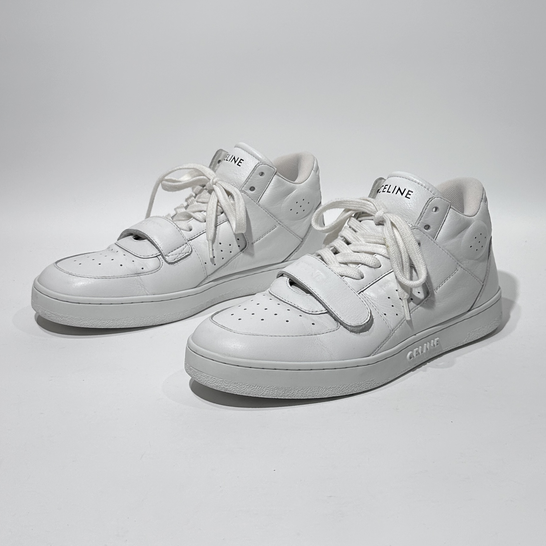 95新 Celine/思琳 39码 白色时尚高帮板鞋/ML80333
