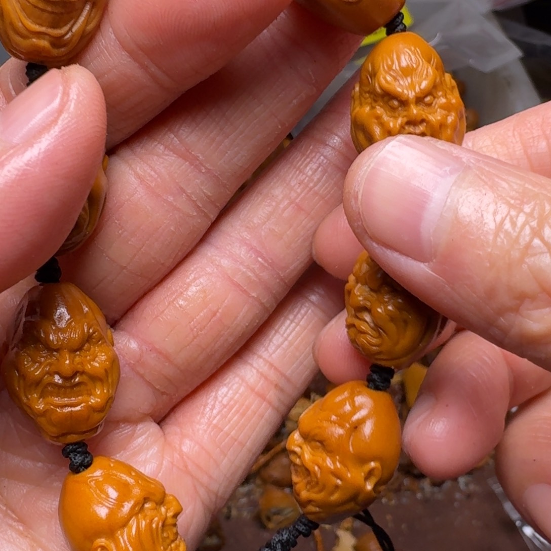 手串橄榄核你的电话