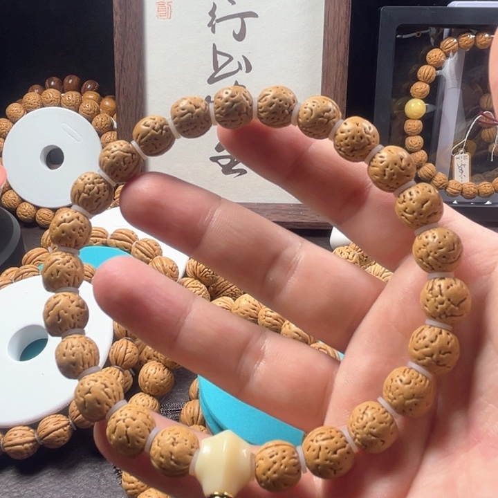 桃核手串耶*i11尺寸金豆手持