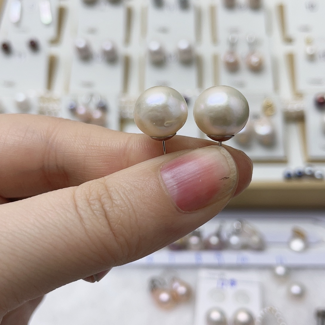 钟***礼淡水珍珠银S925镶嵌耳饰