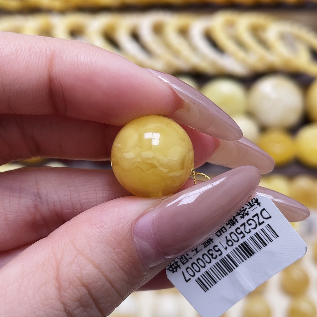 幸***生琥珀未镶嵌裸石15.4mm圆珠瑕
