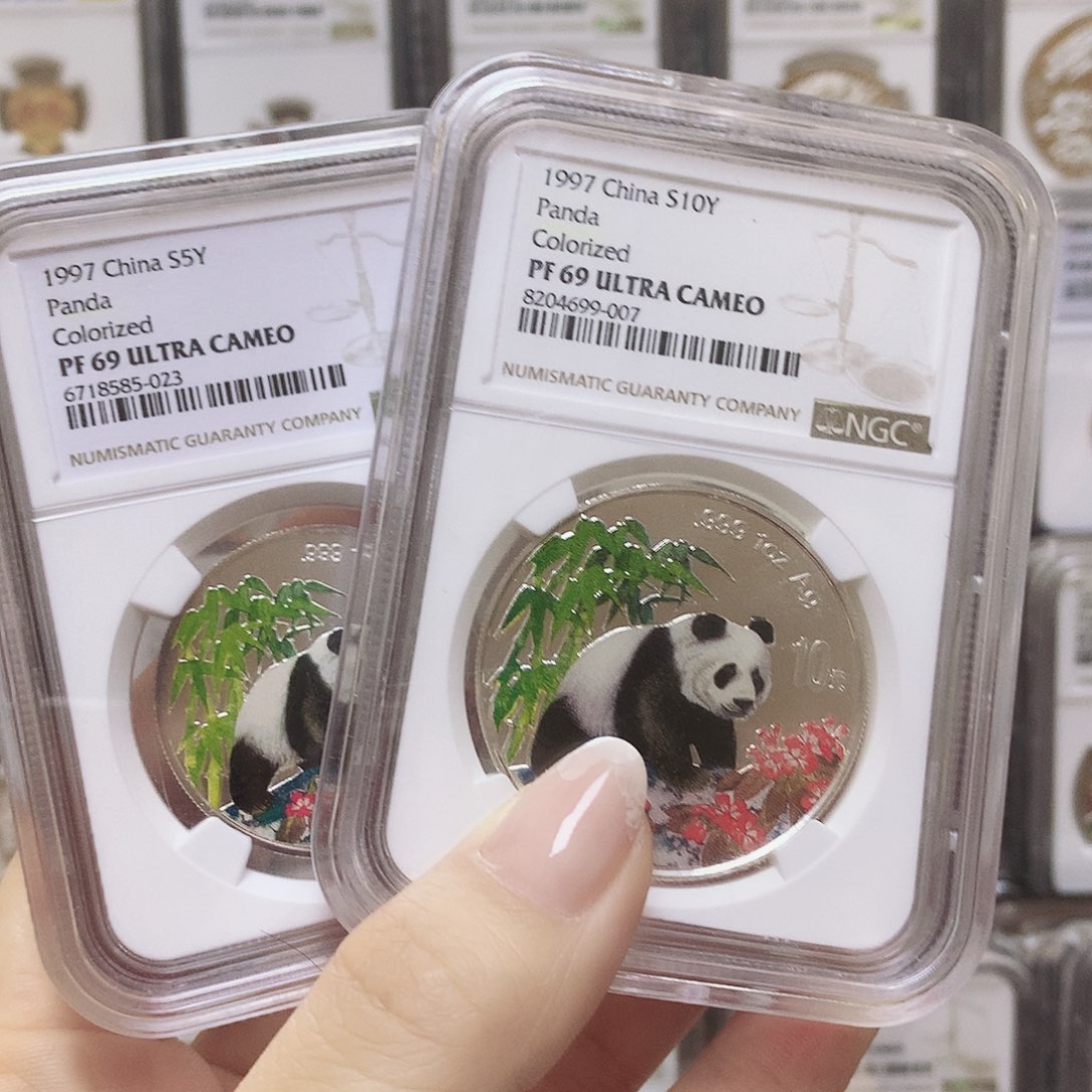 纯银1997年彩银猫1/2+1盎司无证69分