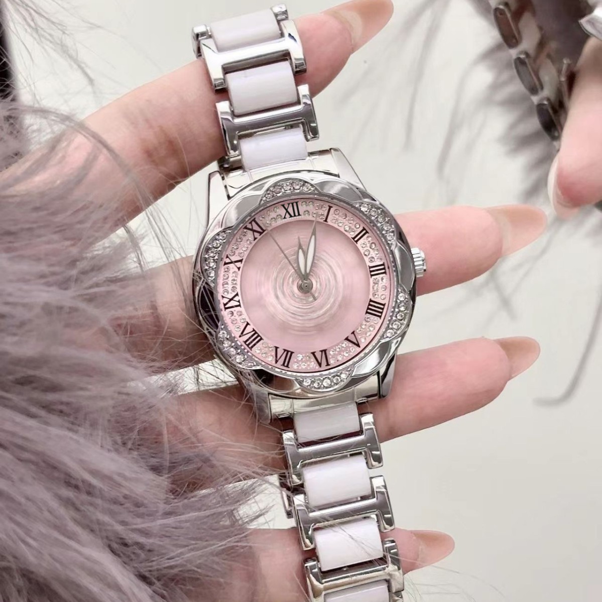 【官方正版}新款粉色旋转表盘太阳花系列镂空背透