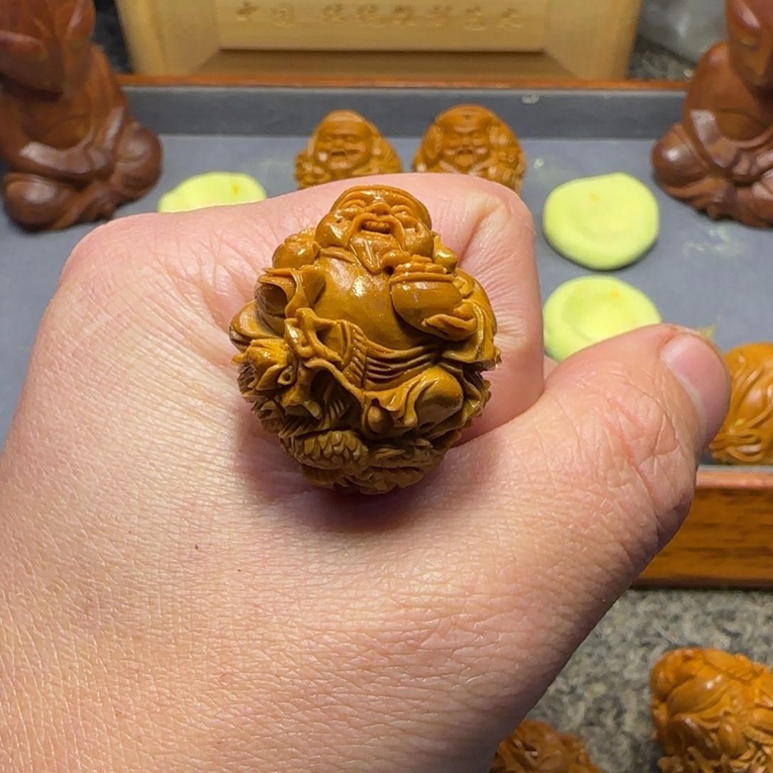 橄榄核吊坠葡**浪……………………