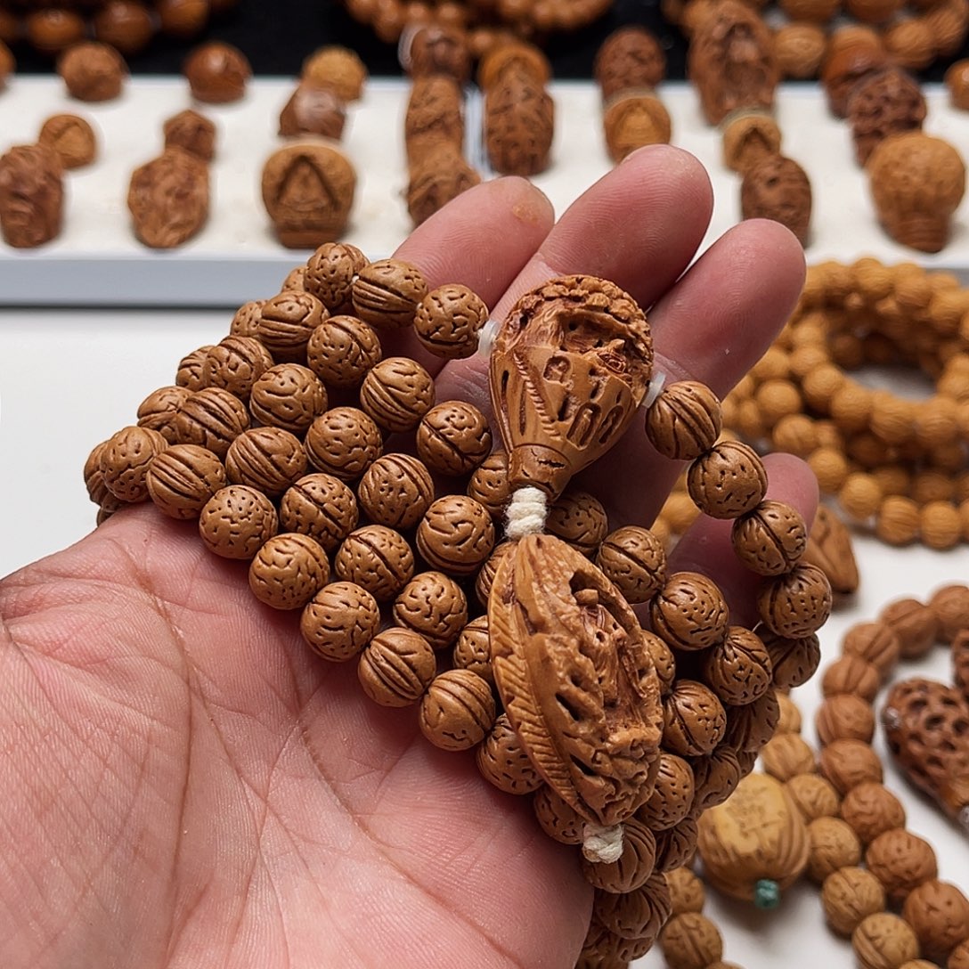 阿***伏手工桃核工艺制作