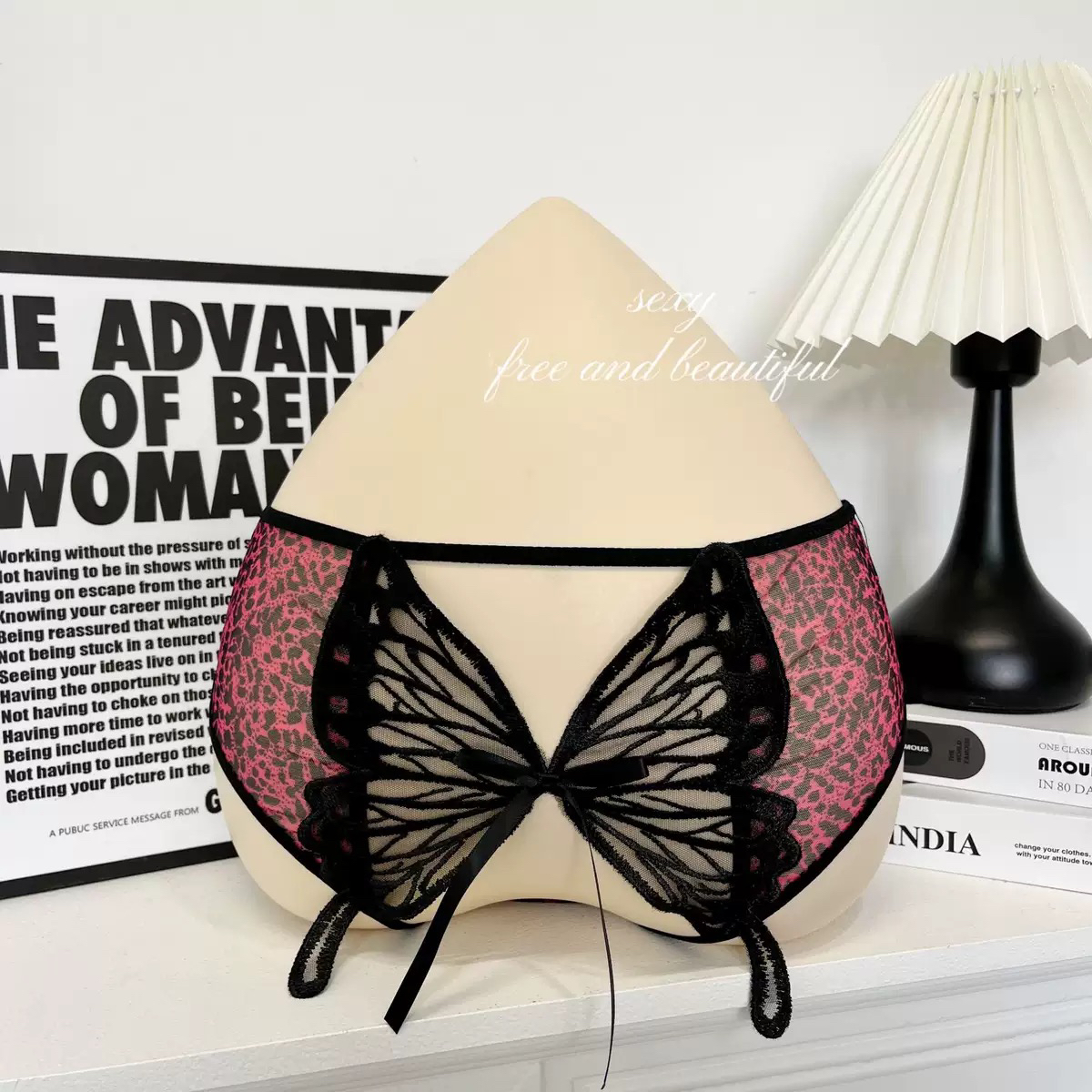 性感诱惑镂空豹纹蝴蝶拼接设计女士透气网纱三角内裤