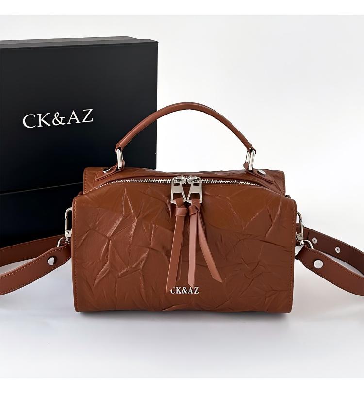 CKAZ春夏新款女士时尚潮流手拿包2402棕色