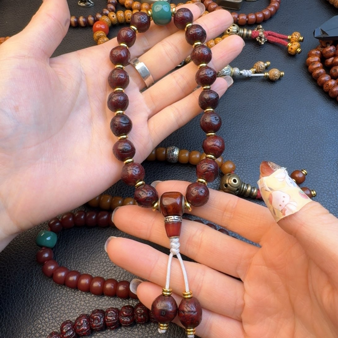 风车木（黑檀木）L****i风眼