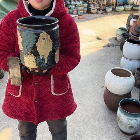 口21高24瑕疵盆子。