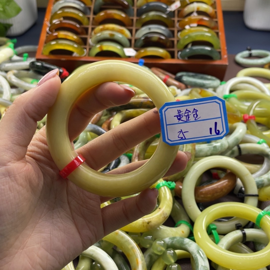 黄***金蛇纹石玉未镶嵌手镯