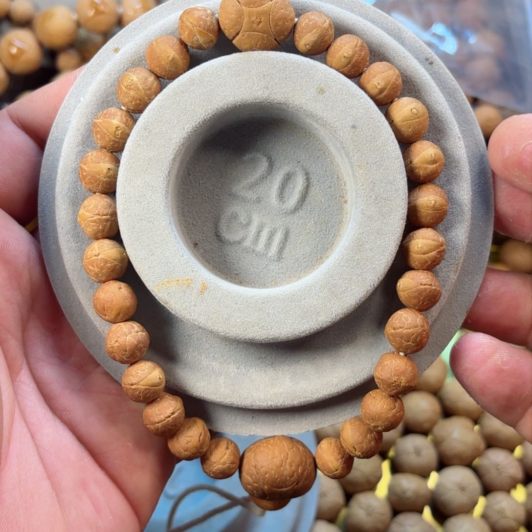 凤眼菩提吊坠9.5手持