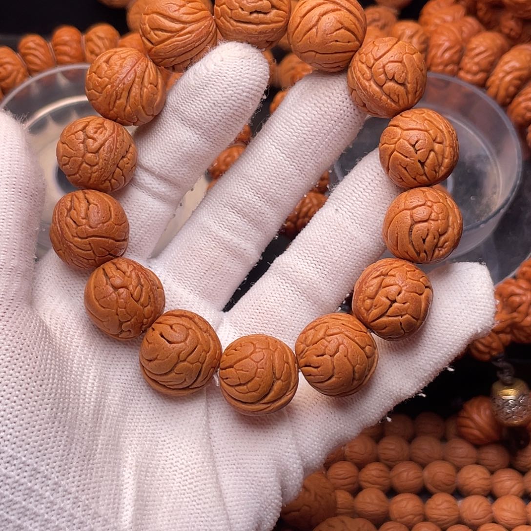 手串桃核金丝龙珠1.8