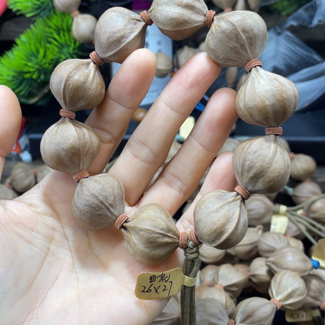 磐***石橄榄核吊坠2627四花铁核