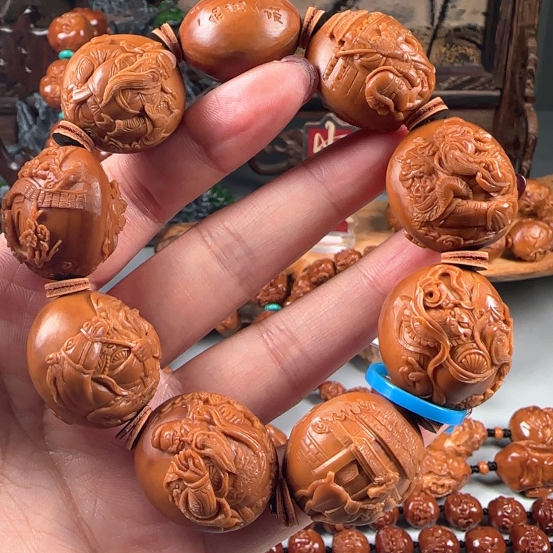 橄榄核手串/手链宽2.4梅林鸡血红核双面浮雕关公手串手持