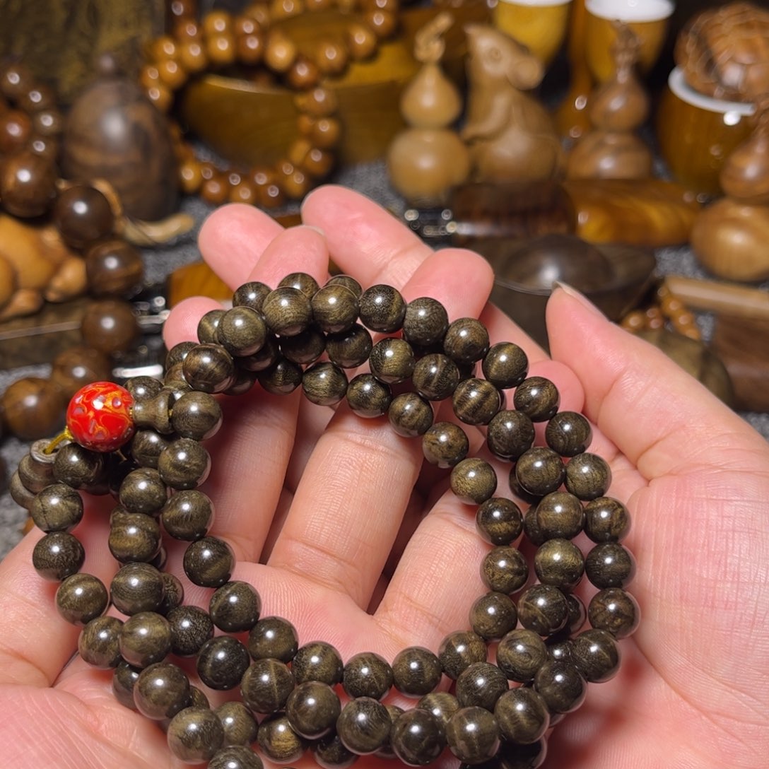 金丝楠阴沉木花纹佛珠0.8