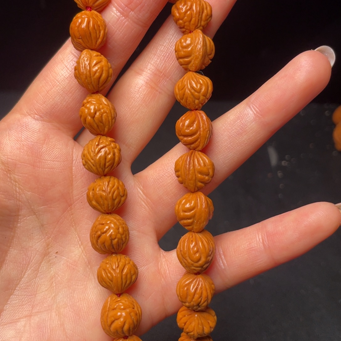 春***ଲ桃核吊坠红红火火