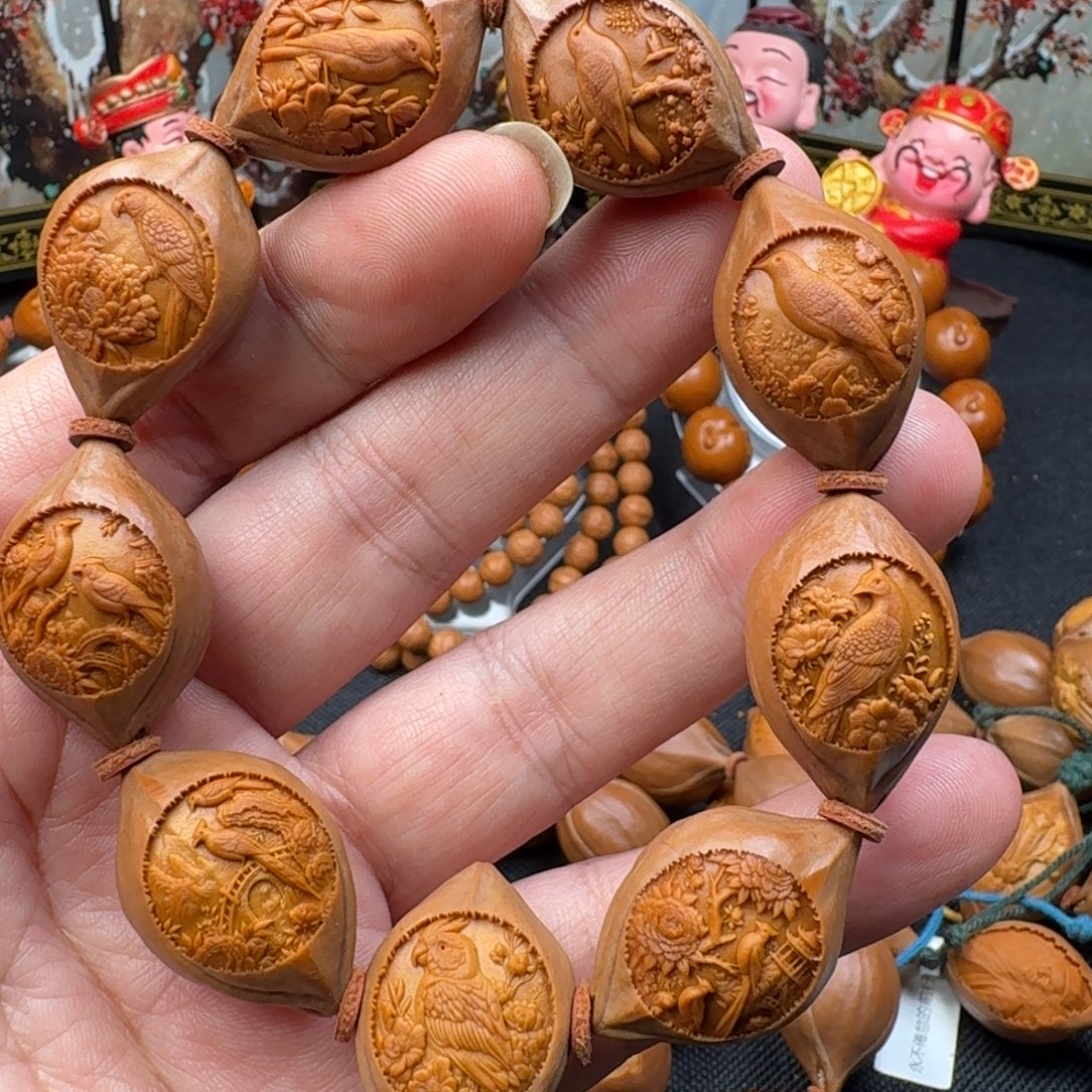 C***e橄榄核手串/手链鸟