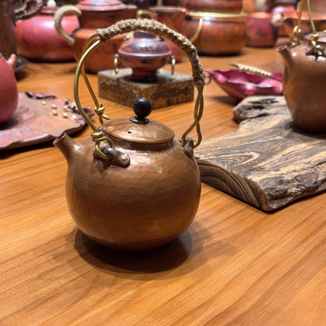 240圆烤色提亮泡壶手工锻打工艺
