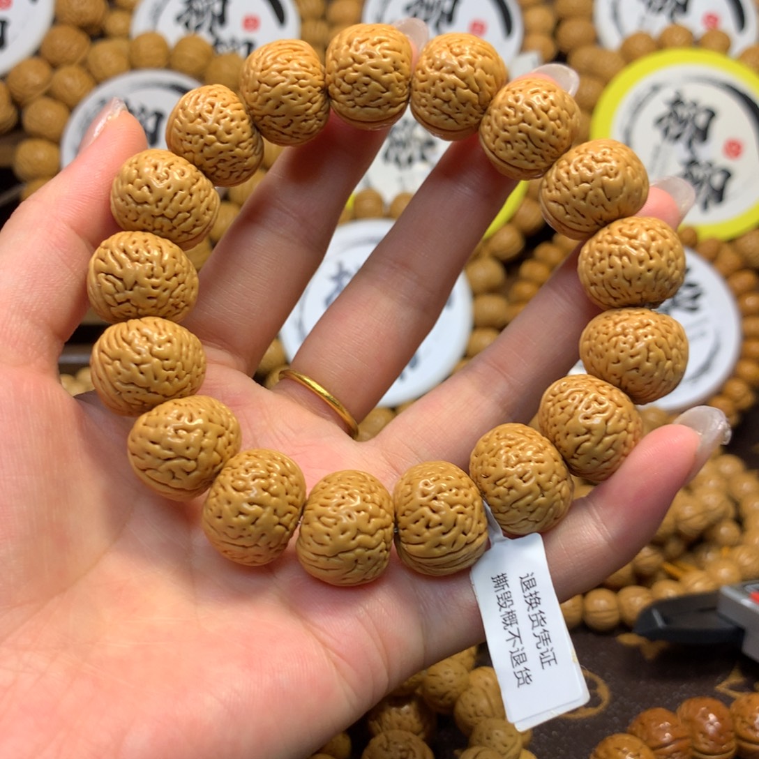 张***雄精品桃核磨盘手串