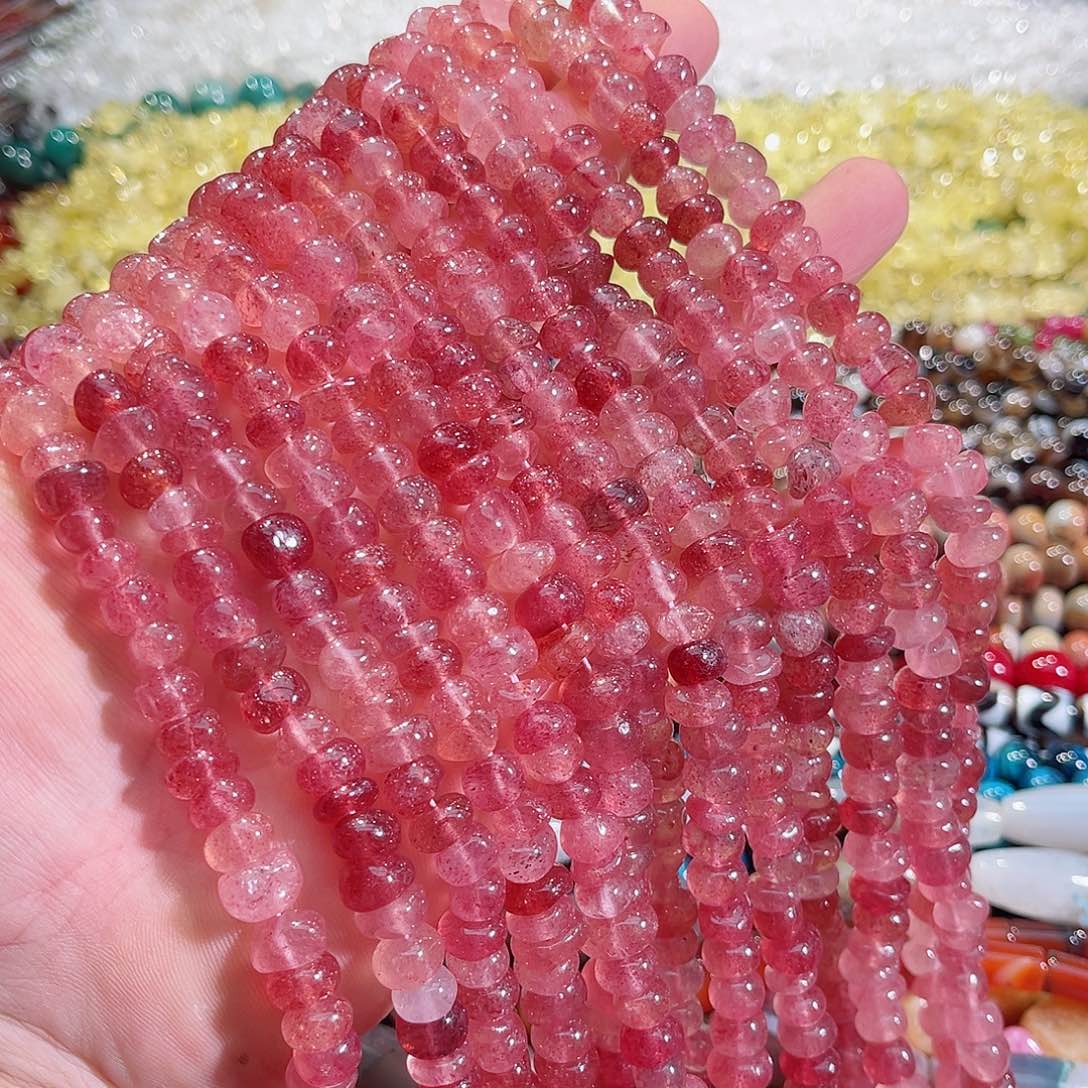 玛瑙/玉髓未镶嵌珠宝半成品红草莓水晶中孔隔片一条10mm