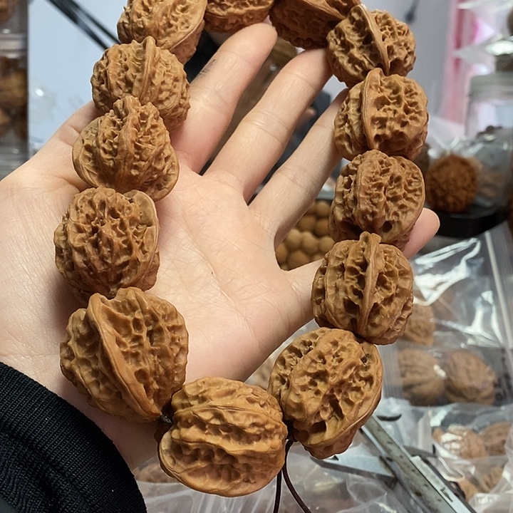 文玩核桃把件32.5磐石手持油