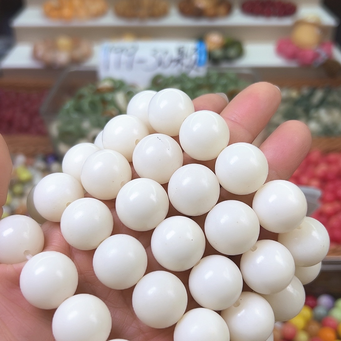 菩提根/象牙果手串瑕疵大白圆1条